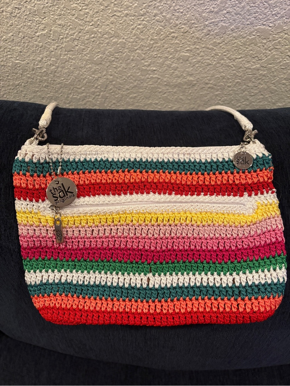 The Sak Rainbow Stripe shoulder bag.  NWOT